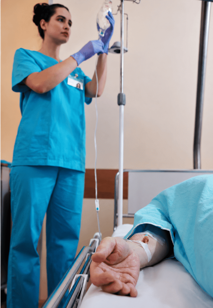 Patient receiving post-surgical care during hospital recovery
